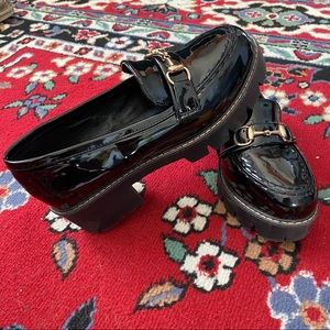 Black platform chunky loafers gold hardware